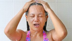 Is It Okay To Take a Shower With Your Clothes On_Shower Maestro